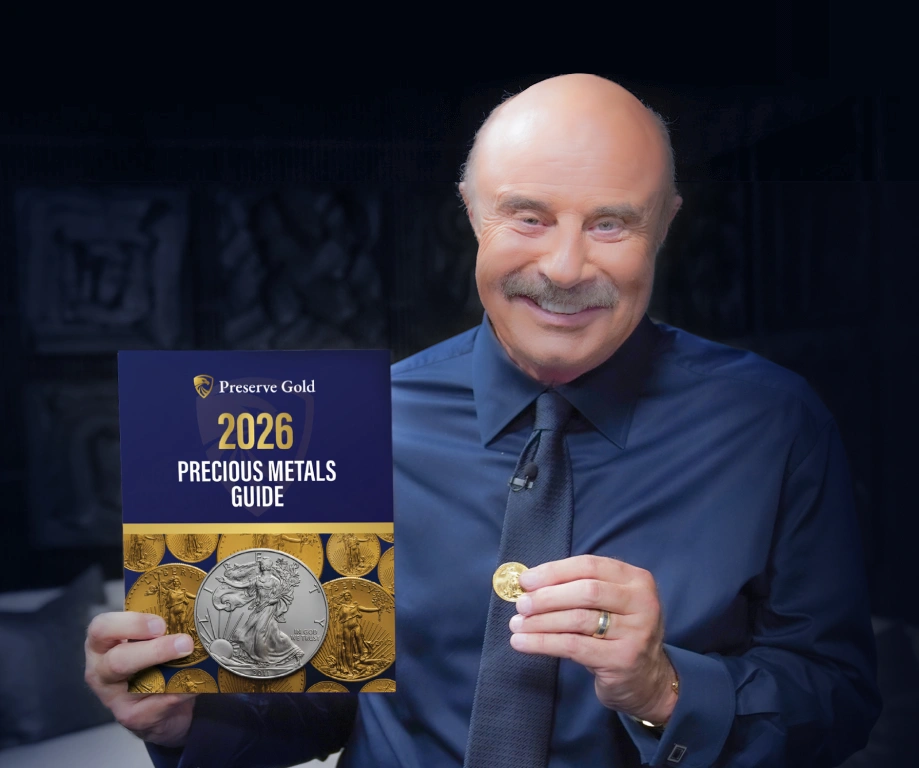 Dr. Phil holding PRG Guide